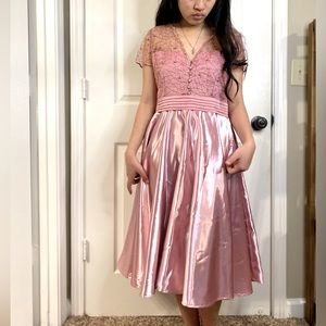 A handmade dress, never wear. Sewn by seamstress